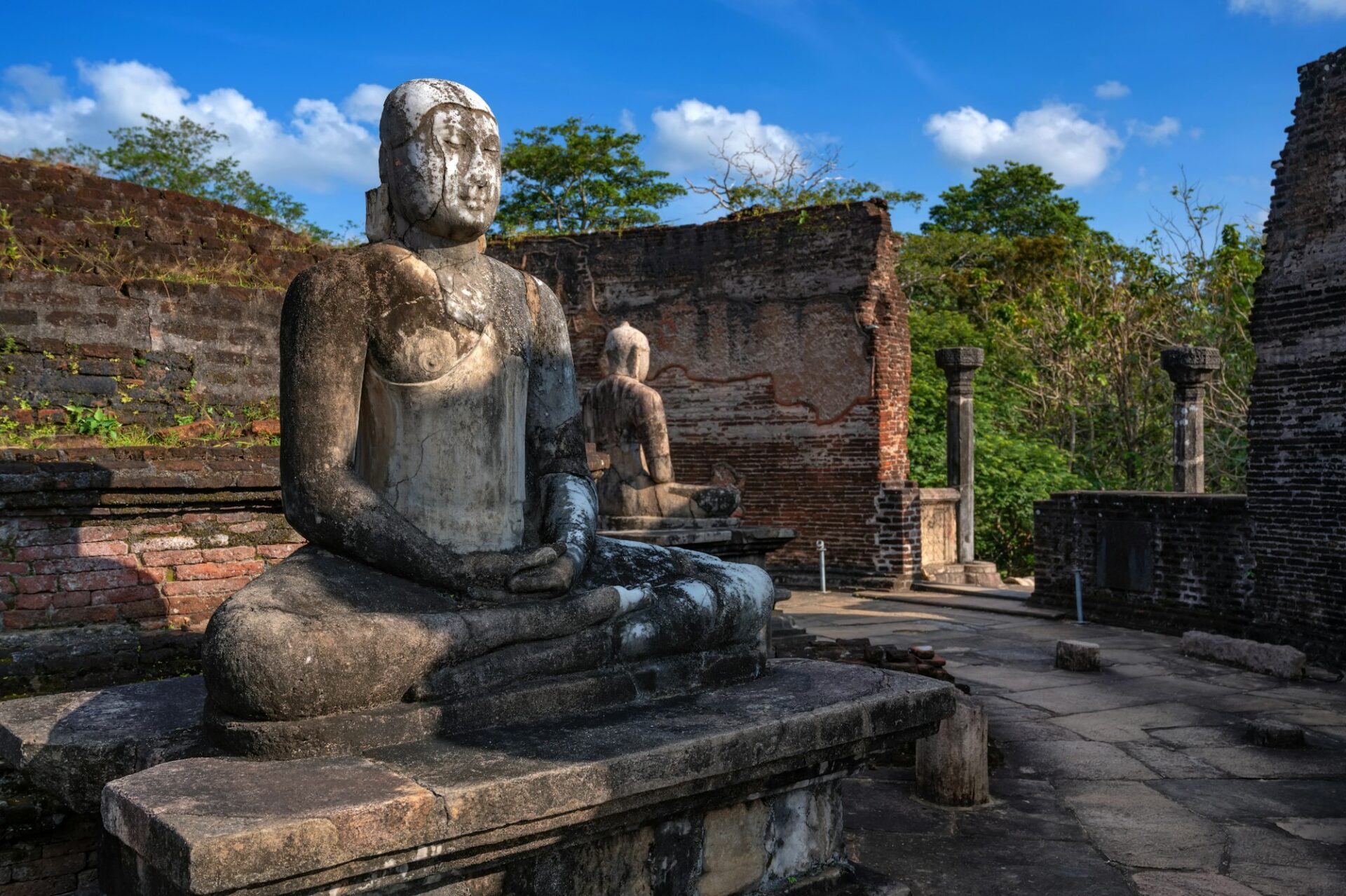 Buddha images in Vatadage temple in ruins of Polonnaruwa in Sri Lanka