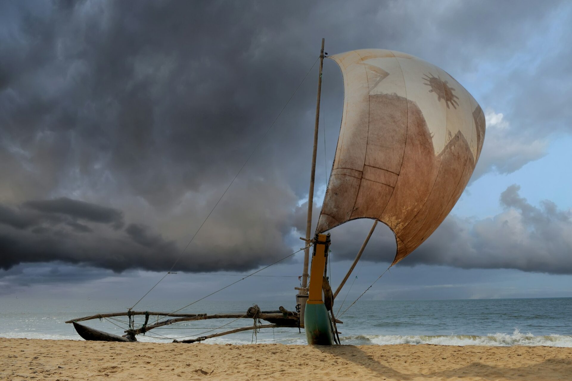 Fishing boats resting on empty beach in Sri Lanka