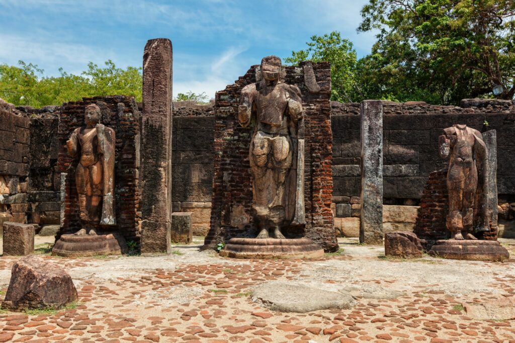 Stainding Buddha statue in ancient ruins. Polonnaruwa, Sri Lanka