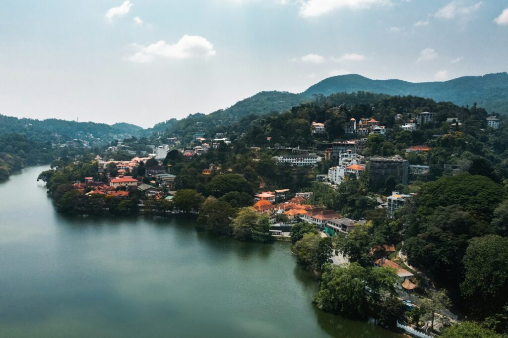 Aerial drone view of Kandy lake and city famous country landmark in Sri Lanka.