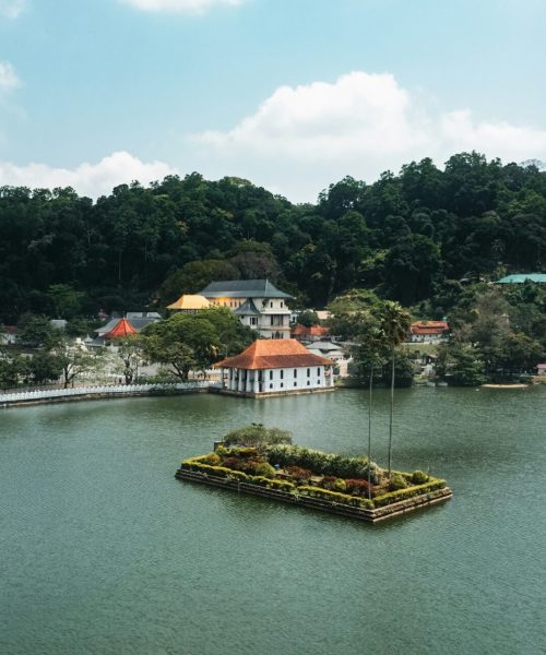 Aerial drone view of Kandy lake and famous city landmark Sri Dalada Maligawa Temple in Sri Lanka.