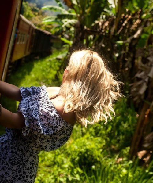 Extreme lady tourist travelling to sri lankan train in Sri Lanka, enjoying looking